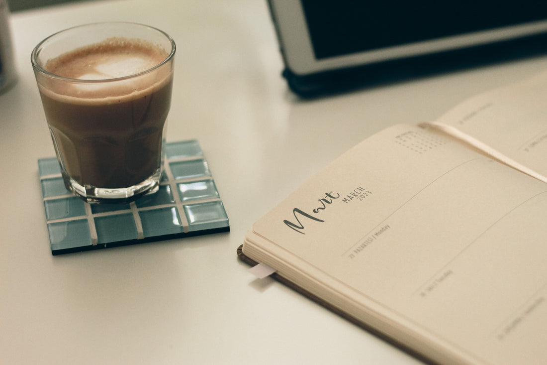 An open planner with a morning wellness routine laid out — how long to microdose for optimal benefits